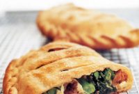 Savory Sausage and Broccoli Rabe Calzones