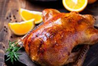 Golden Rotisserie Duck with Bright Orange and Aromatic Rosemary