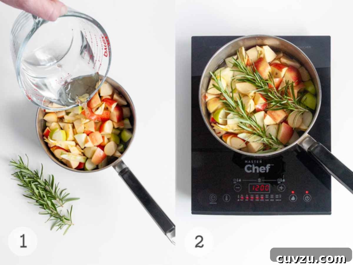 Orchard's Golden Jelly 6 Apples, fresh rosemary, and water are combined in a saucepan, ready for simmering to create the base for delicious apple jelly.