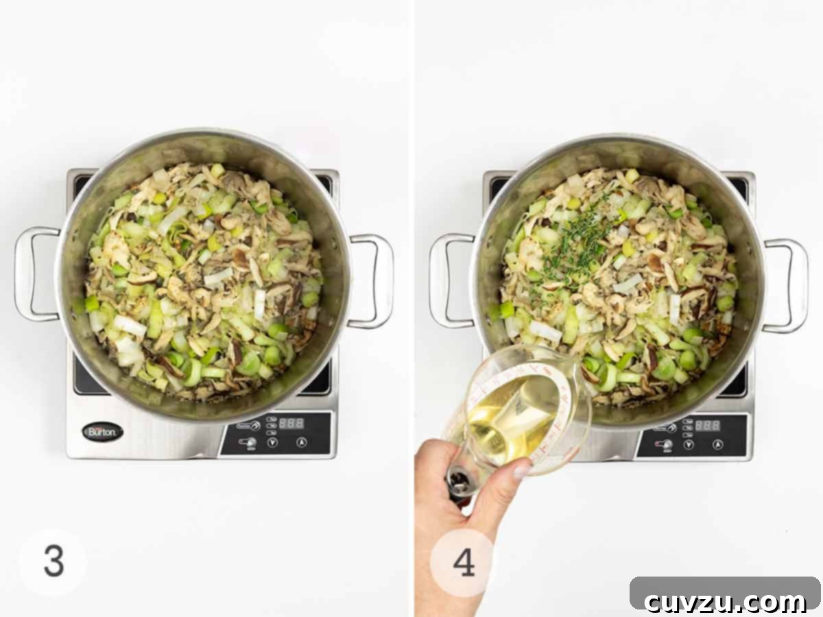 Sauteed vegetables in a pot with a person pouring white wine into the pot to deglaze.