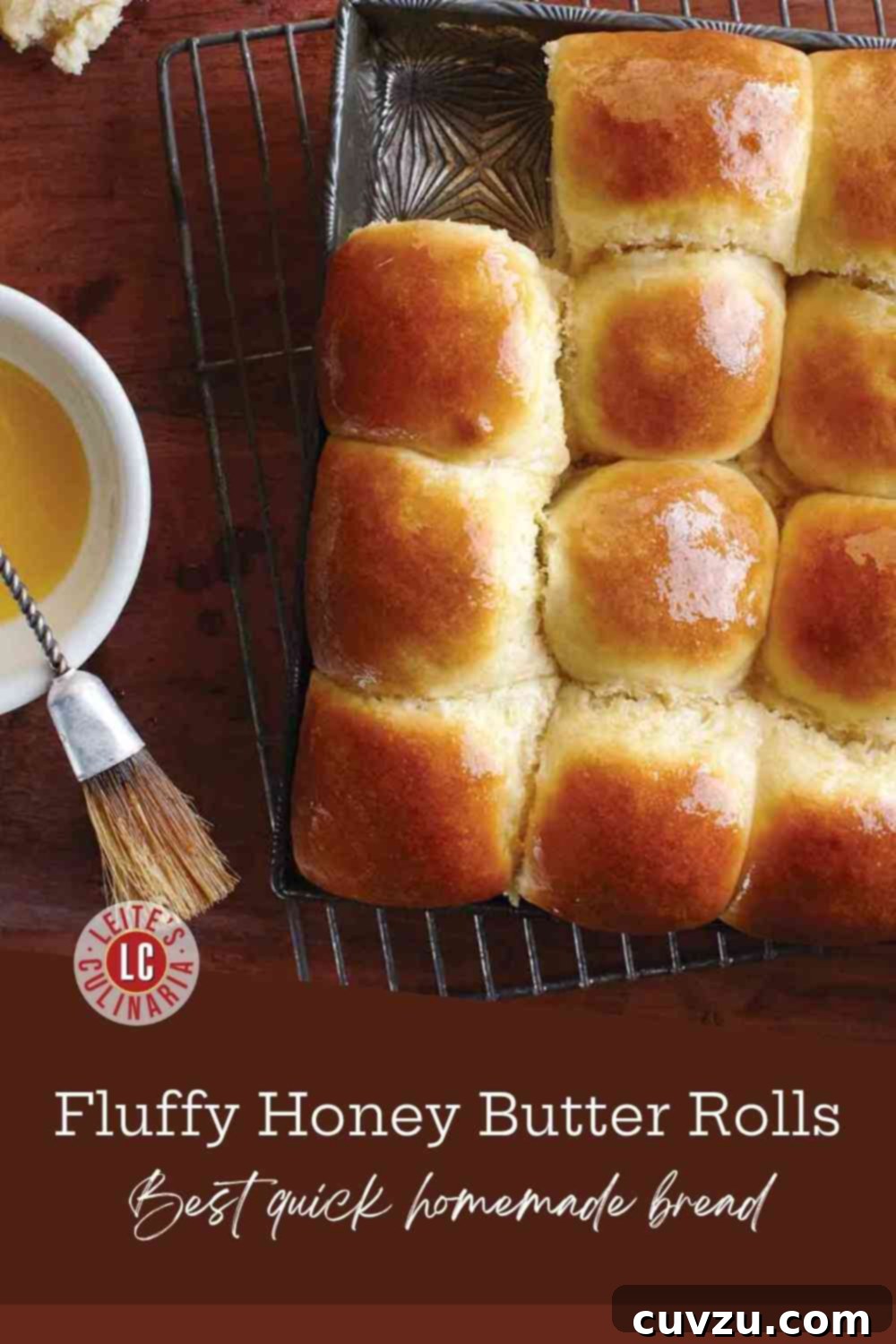 Soft & Fluffy Dinner Rolls 3 A dozen fluffy, golden-brown honey butter dinner rolls, glistening with a fresh brush of melted butter, cooling on a wire rack.