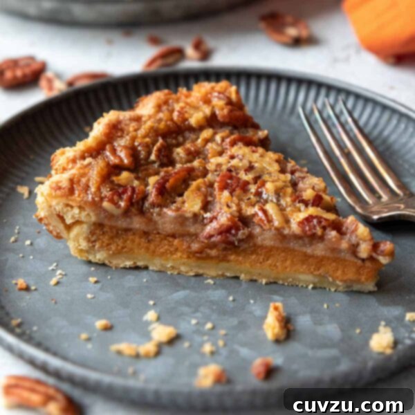 Autumn Spice Pumpkin Pecan Pie 9 A slice of pumpkin pecan pie on a plate with the remainder of the pie in the background.