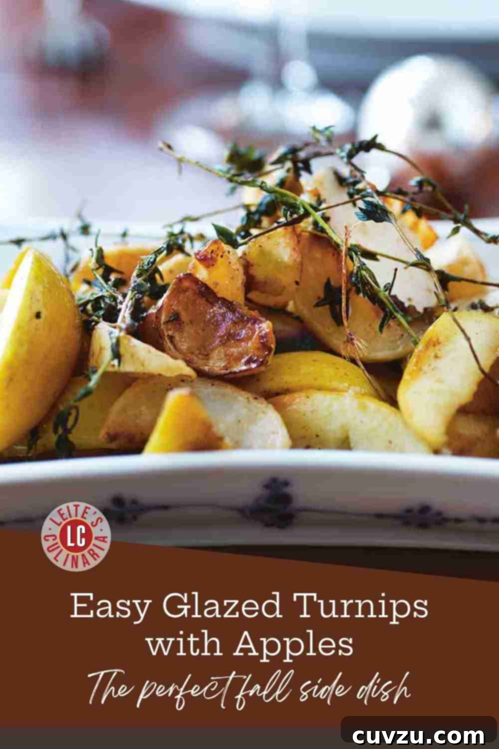 Caramelized Turnips and Apples 3 Close-up of glossy, glazed turnip and apple wedges garnished with fresh thyme on a white platter, ready to be served.
