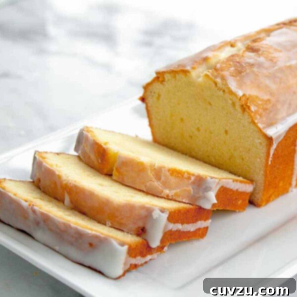 Velvet Cream Cheese Pound Cake 5 A beautifully sliced cream cheese pound cake with a generous lemon glaze.