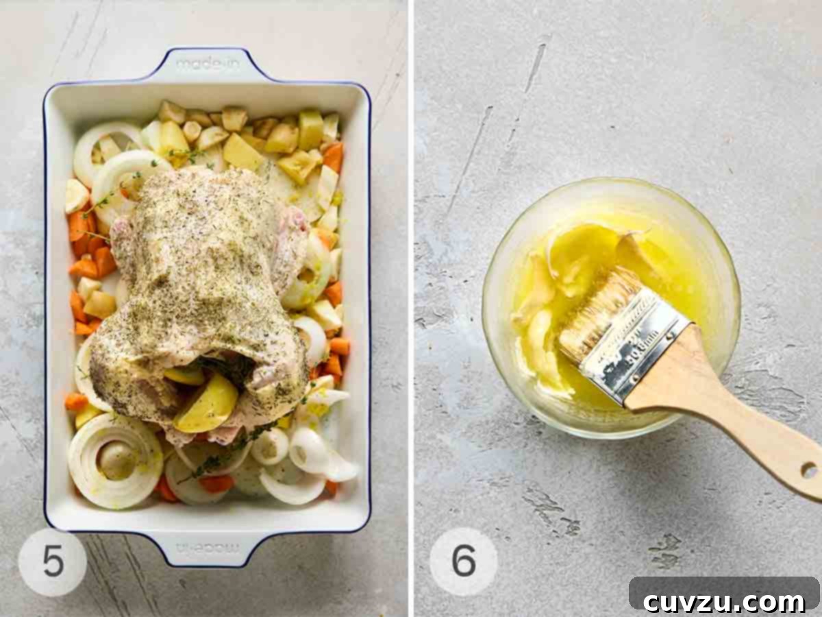 Classic French Roast Chicken 7 A two-part image demonstrating the roasting process: a seasoned and stuffed whole chicken positioned on a bed of root vegetables and onion slices in a roasting pan; nearby, a small bowl of garlic butter with a basting brush rests, ready for use.