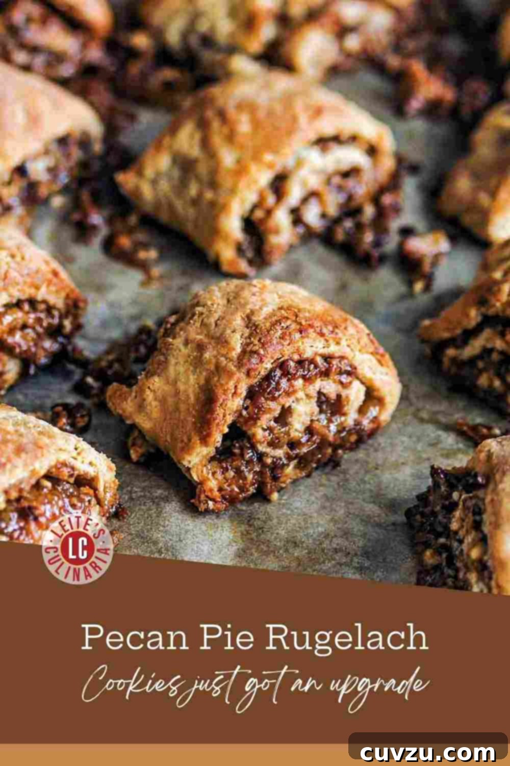 Southern Pecan Rugelach 3 Baked spiral-cut cream cheese dough, filled with a dark pecan pie mixture, rests on a baking sheet, showcasing its golden perfection.