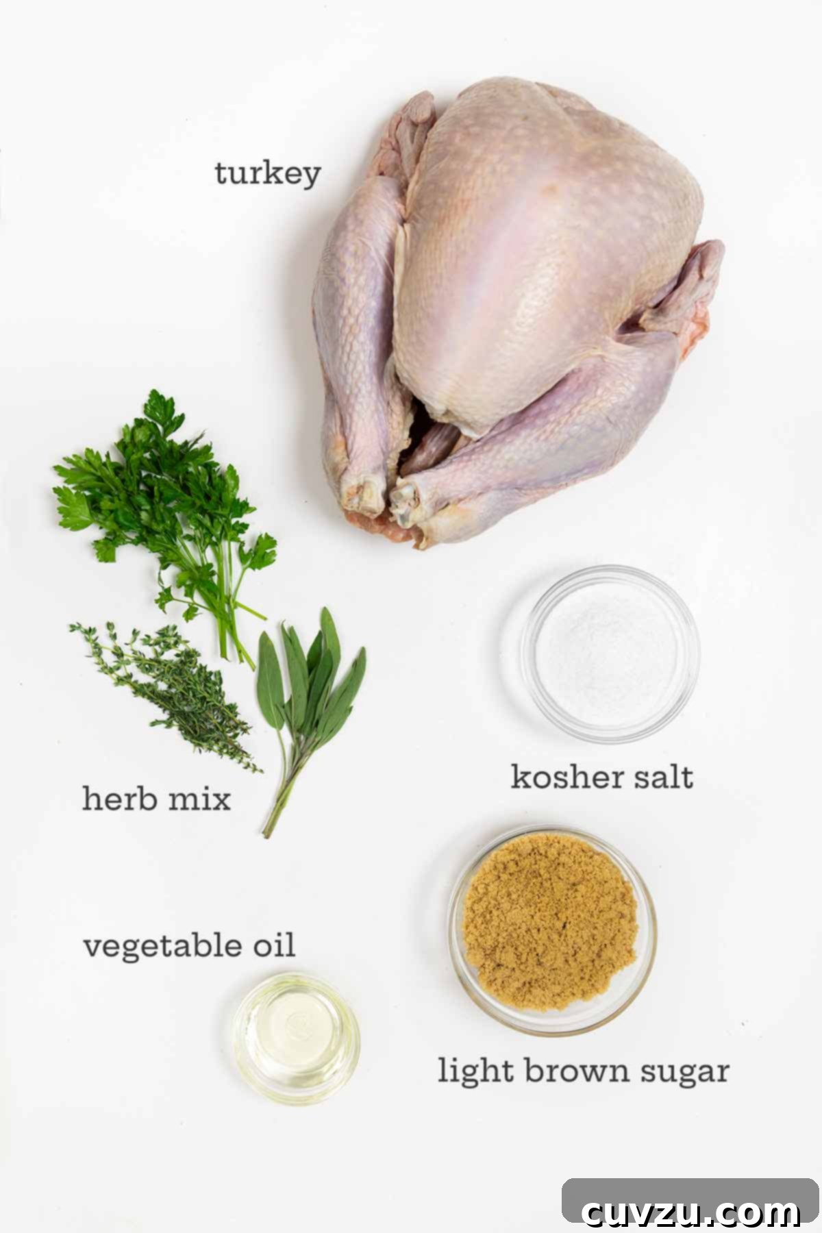 Flavorful Dry Brine Turkey 5 Ingredients for dry brine turkey--turkey, herbs, kosher salt, oil, and brown sugar.