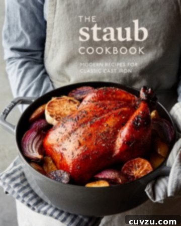 The Staub Cookbook cover featuring elegant cookware and dishes.