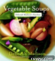 Tropical Golden Pea Coconut Soup 4 The cover of 'Vegetable Soups from Deborah Madison's Kitchen,' a renowned cookbook featuring inspiring vegetarian recipes.