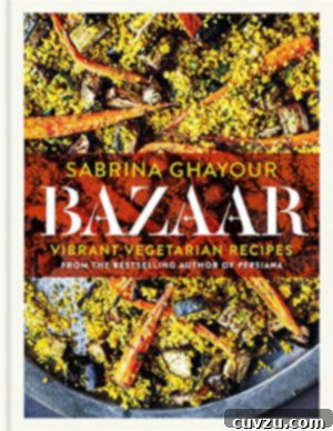 The cover of the Bazaar Cookbook by Sabrina Ghayour, featuring an inviting array of Middle Eastern inspired dishes.
