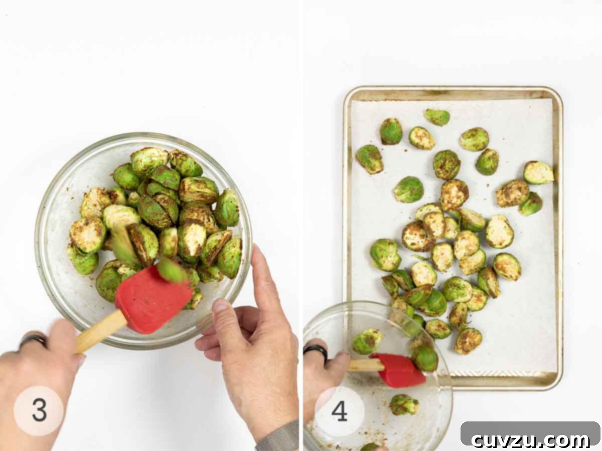 Kickin' Crispy Brussels 5 Halved Brussels sprouts being tossed with dressing in a bowl, then spread in a single layer on a parchment-lined sheet pan.