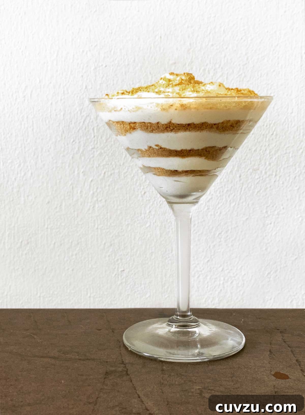 Serradura: Portugal's Creamy Crumb Pudding 2 A serving of Portuguese sawdust pudding layered in a martini glass.