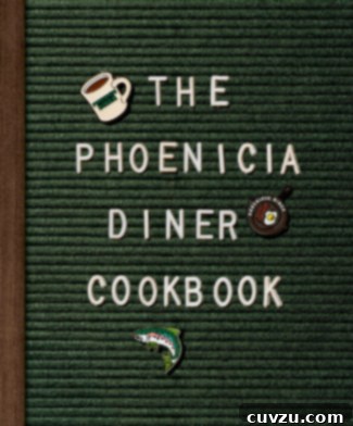 The Phoenicia Diner Cookbook cover, featuring an inviting image of classic diner food.