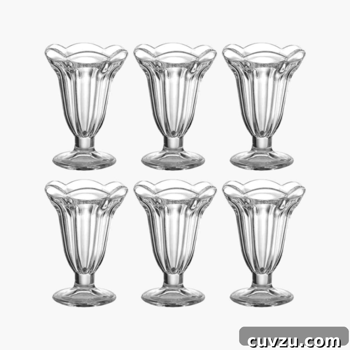 Dog Days Survival Guide: Essential Hacks for Summer Heat 2 Six elegant tulip sundae glasses, perfect for layered desserts, filled with ice cream and toppings.