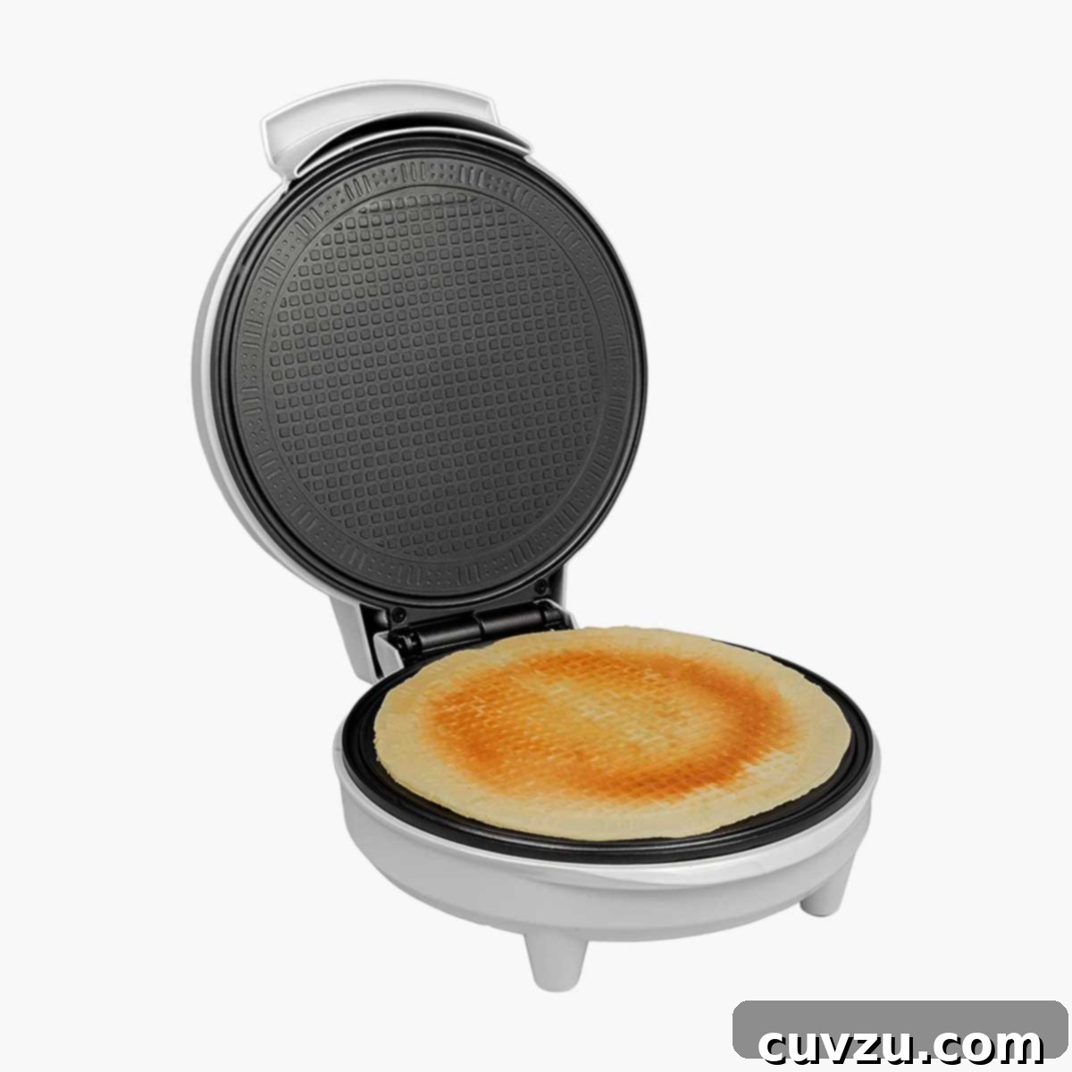 Dog Days Survival Guide: Essential Hacks for Summer Heat 7 An open CucinaPro waffle cone and bowl maker with a freshly made waffle cone inside, ready to be filled with ice cream.