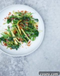 Sautéed Green Beans and Spinach with Golden Breadcrumbs 3 A vibrant side dish of sautéed green beans and spinach with golden bread crumbs.