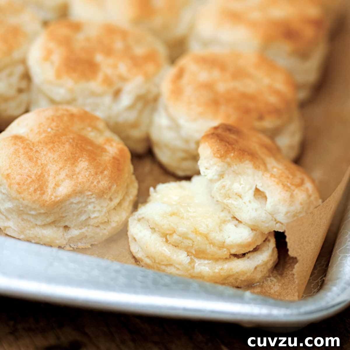 Eight Irresistible Homemade Biscuit Creations 4 A rimmed baking sheet with rows of Southern buttermilk biscuits.