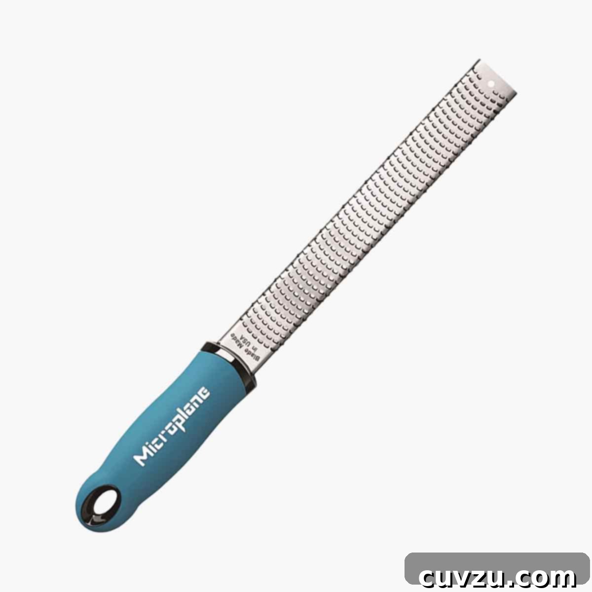 The Zesting Mistake Almost Everyone Makes 3 A blue handled Microplane premium classic series zester grater.