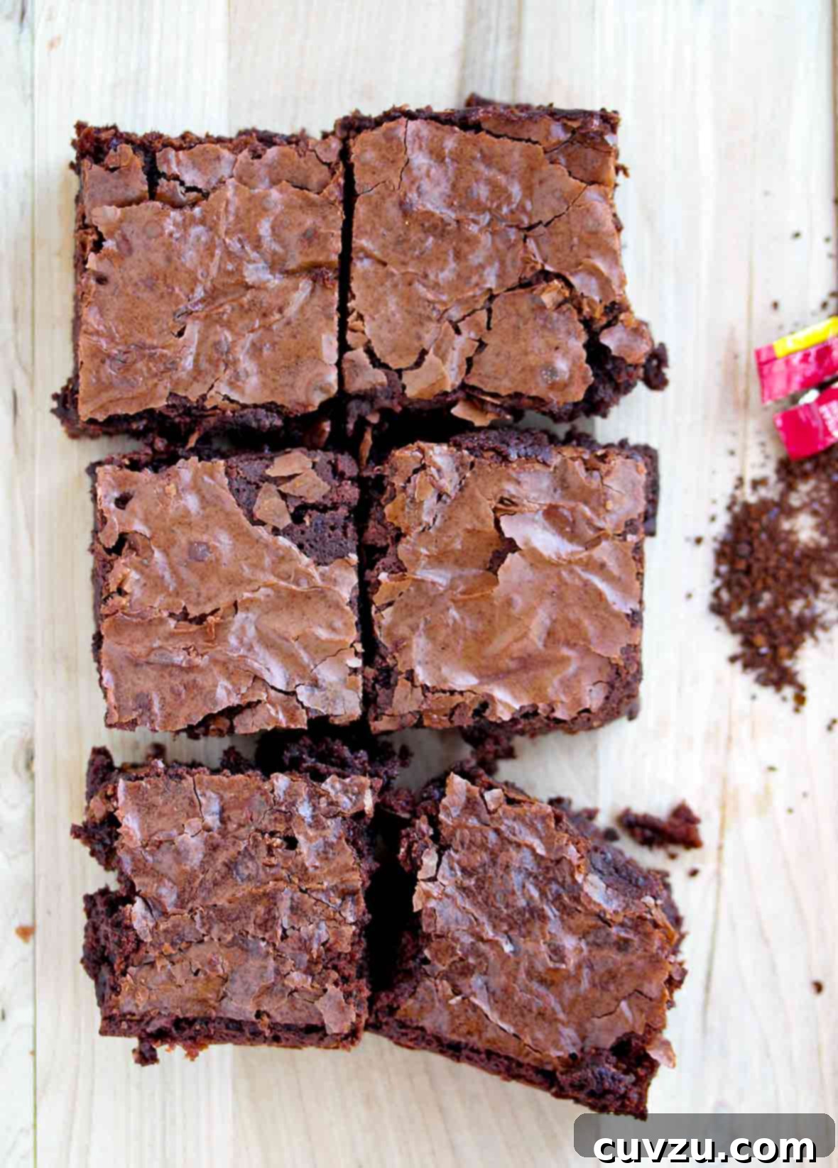 Six one-bowl mocha brownies on wood