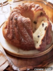 A sliced Kugelhopf in a round metal platter, ready to serve.