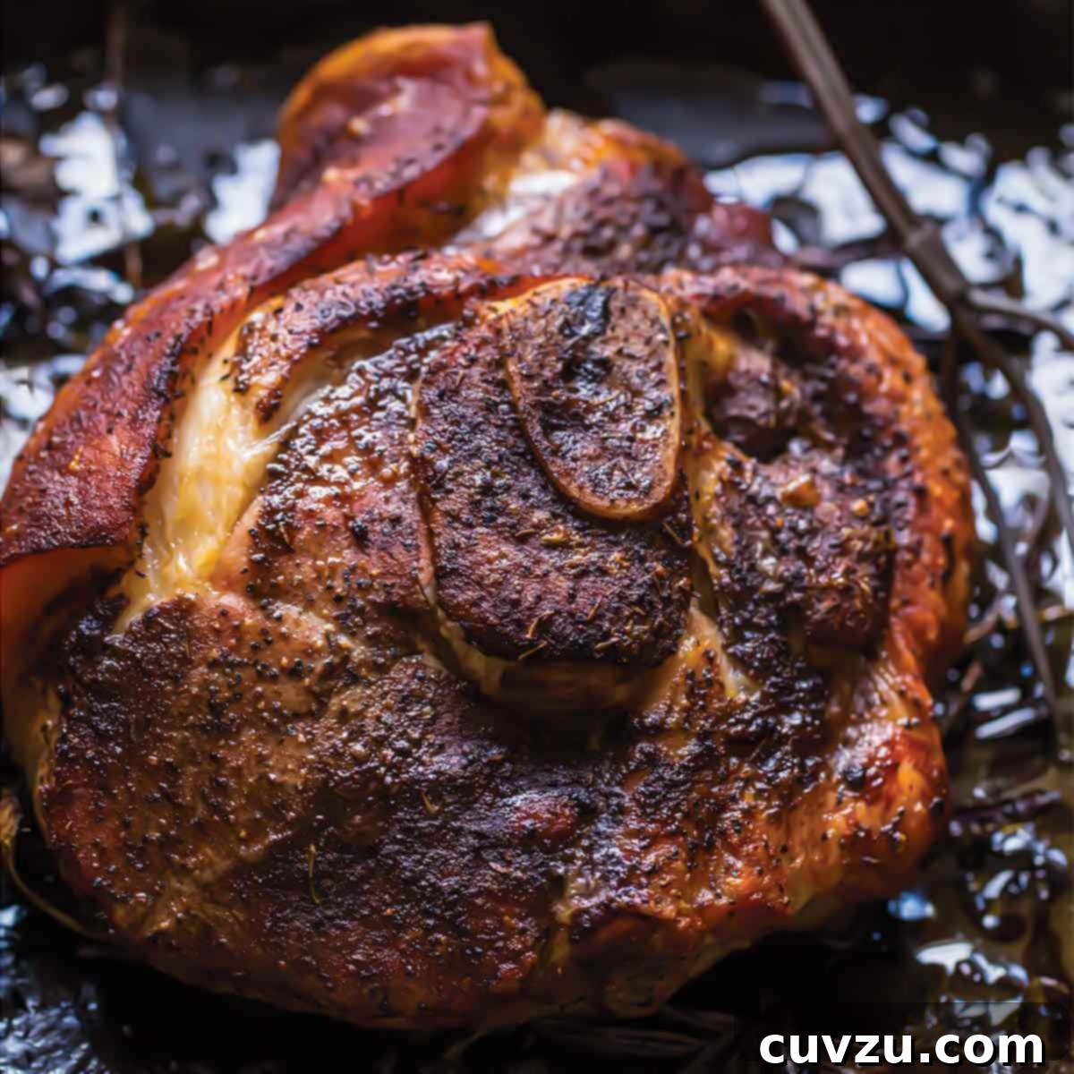 Elevate Your BBQ: 14 Must-Try Smoker Recipes 12 A whole smoked pork shoulder.