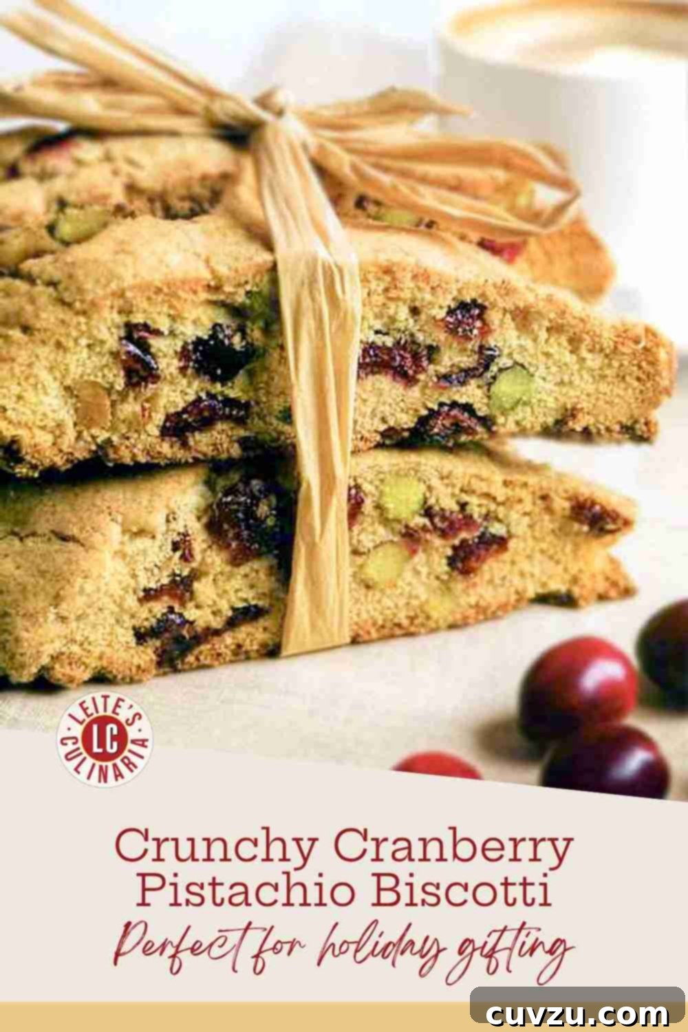 Festive Cranberry Pistachio Biscotti 3 Perfectly sliced, golden-brown biscotti, richly studded with bright red cranberries and vibrant green pistachios, ready to be enjoyed.