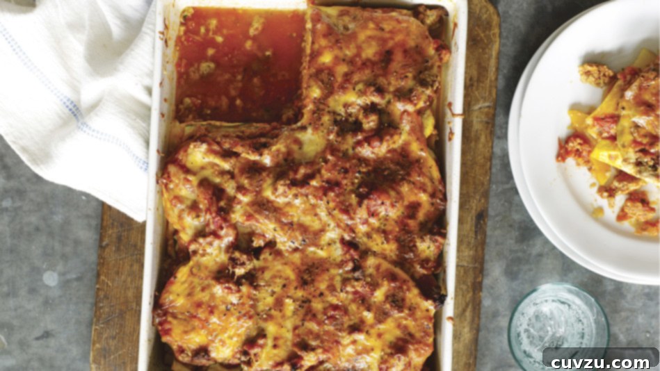 A large, deep casserole dish of Oprah’s hearty turkey lasagna, baked to golden perfection with bubbling cheese on top.