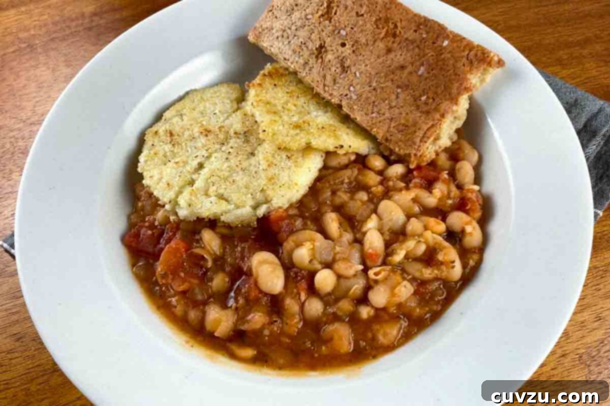 Tuscan White Bean and Tomato Stew with Rosemary 7 Melissa Maedgen's rendition of White Bean Stew with Tomatoes and Rosemary, showcasing a rustic, appealing texture.