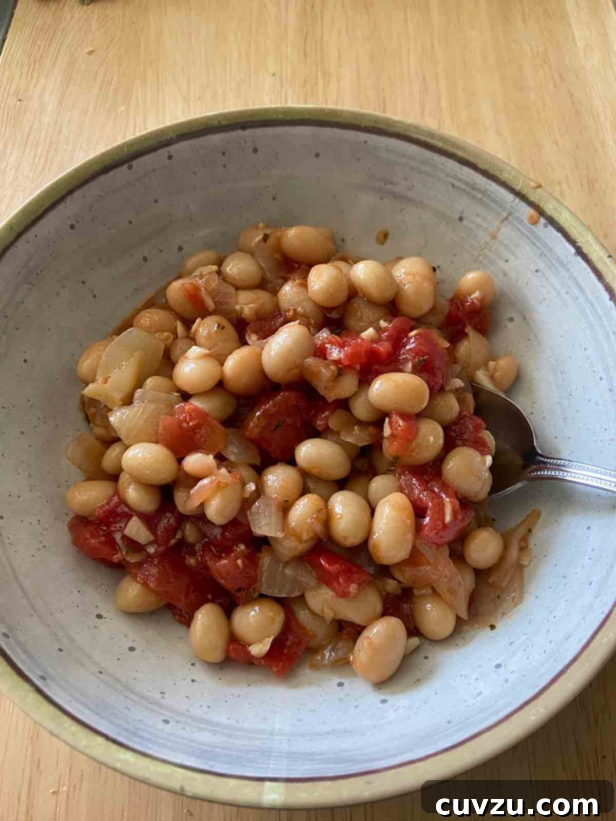 Tuscan White Bean and Tomato Stew with Rosemary 6 Lisa Amtower's beautifully prepared White Bean Stew with Tomatoes and Rosemary.