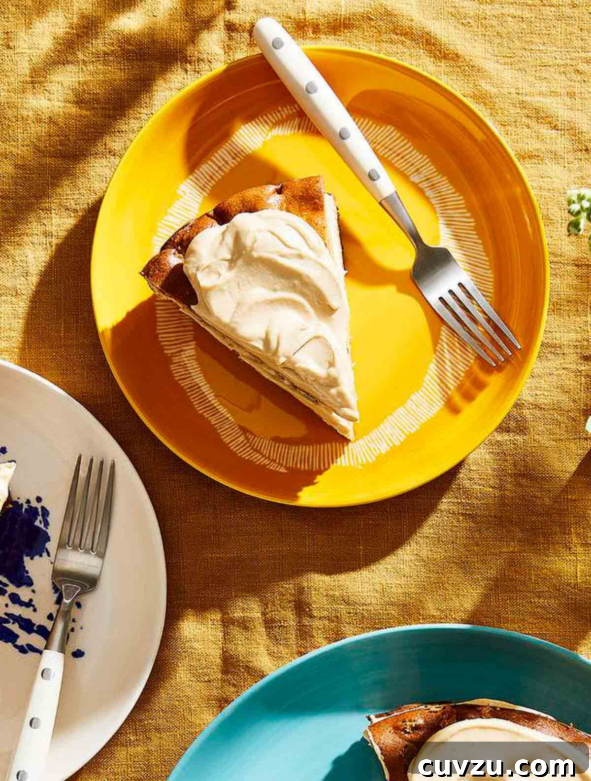 A slice of apple-olive oil cake with maple frosting