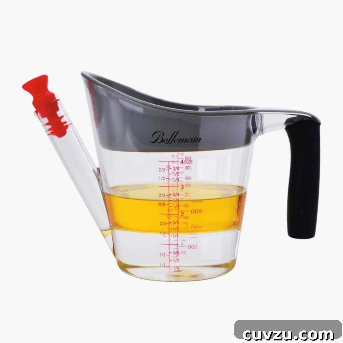 The 10 Must-Have Tools for Thanksgiving Dinner 11 Fat Separator and Measuring Cup shown with water and oil in it.