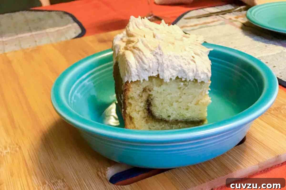 Golden Brown Butter Snickerdoodle Cake 5 Brown Butter Snickerdoodle Cake—S. Mullin, a close-up showing the cake's moist interior and frosting