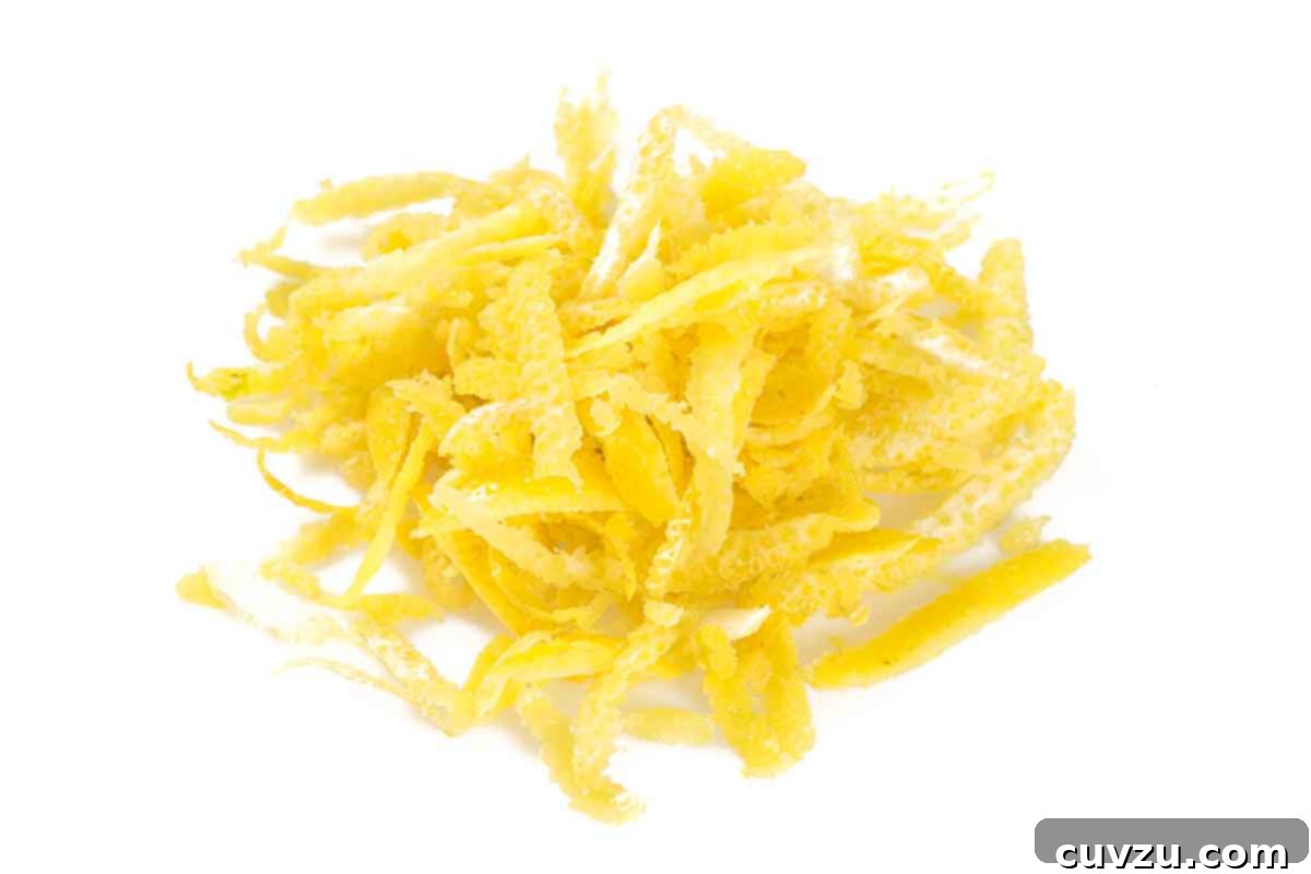 Smart Freezing: Your Guide to Food Preservation 6 A vibrant pile of finely grated lemon zest, showcasing the bright color and texture of fresh citrus zest, ready for baking or cooking.