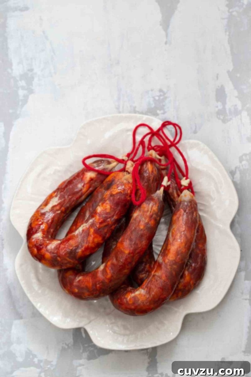 Four links of chouriço pork sausage
