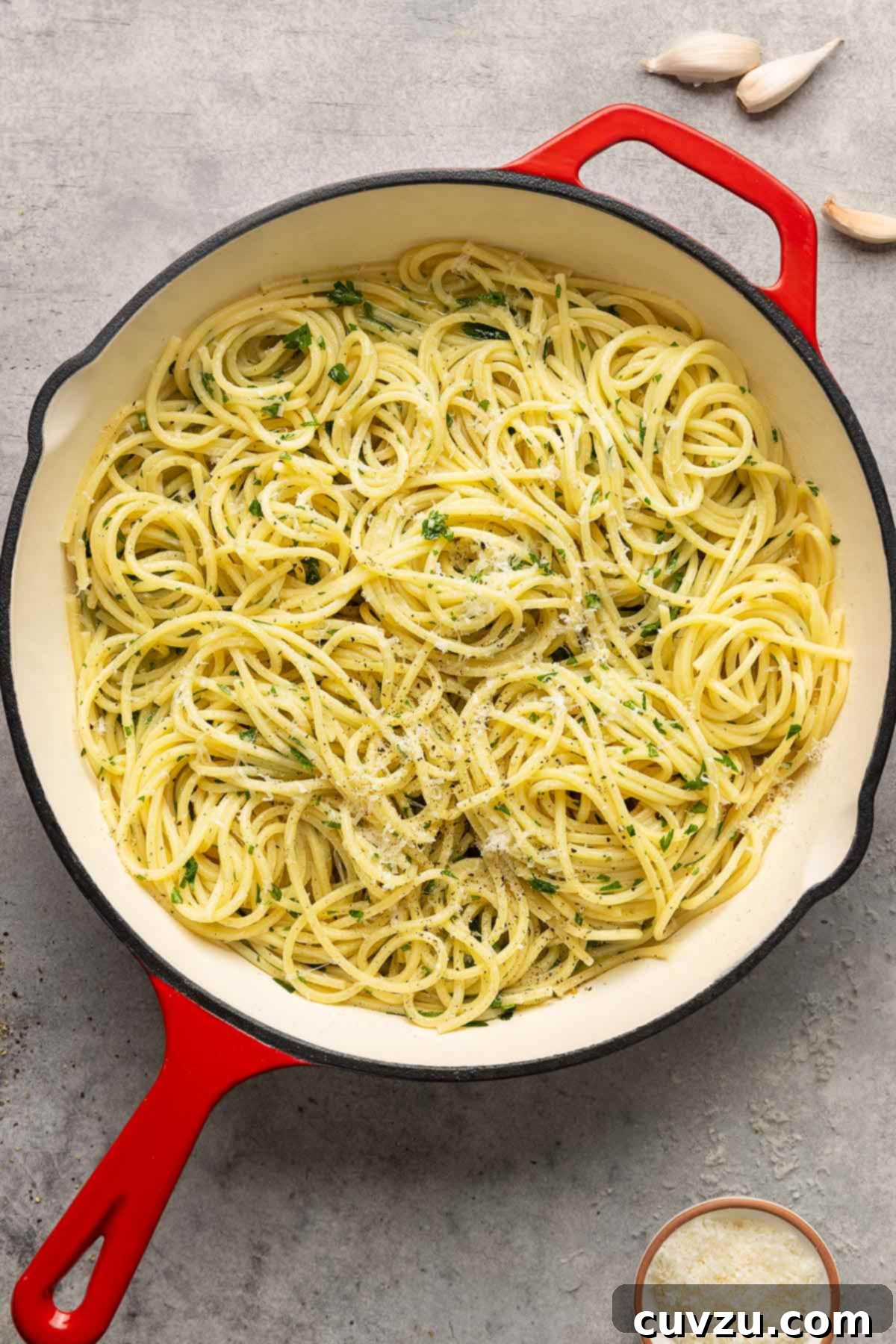Velvety Butter Parmesan Pasta 9 A large skillet brimming with golden, glistening pasta tossed with butter and Parmesan cheese, ready to be served.