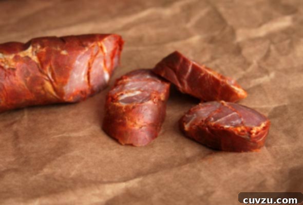 Authentic Homemade Portuguese Chouriço 4 Homemade Portuguese Chourico links, beautifully arranged, showcasing their rich color and texture