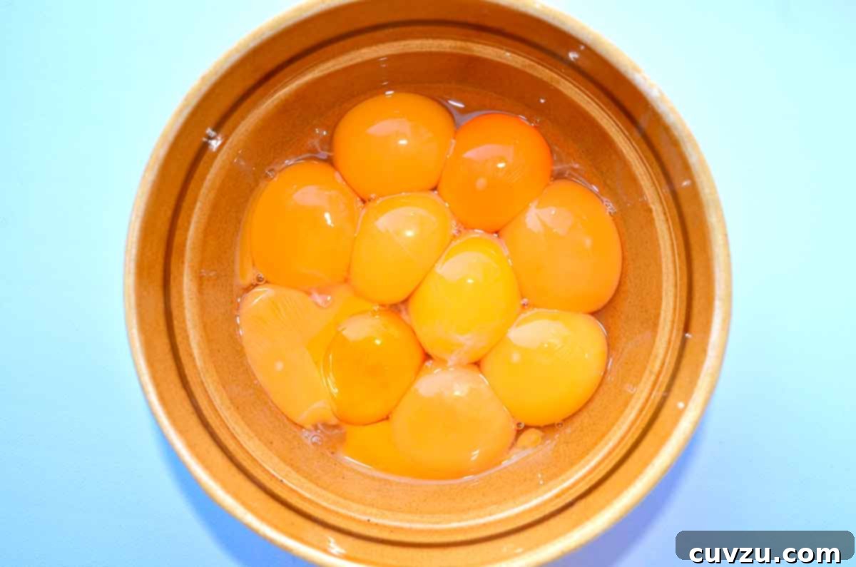 Your Ultimate Guide to Eggs 8 A bowl of yolks that range in color from deep orange to pale yellow
