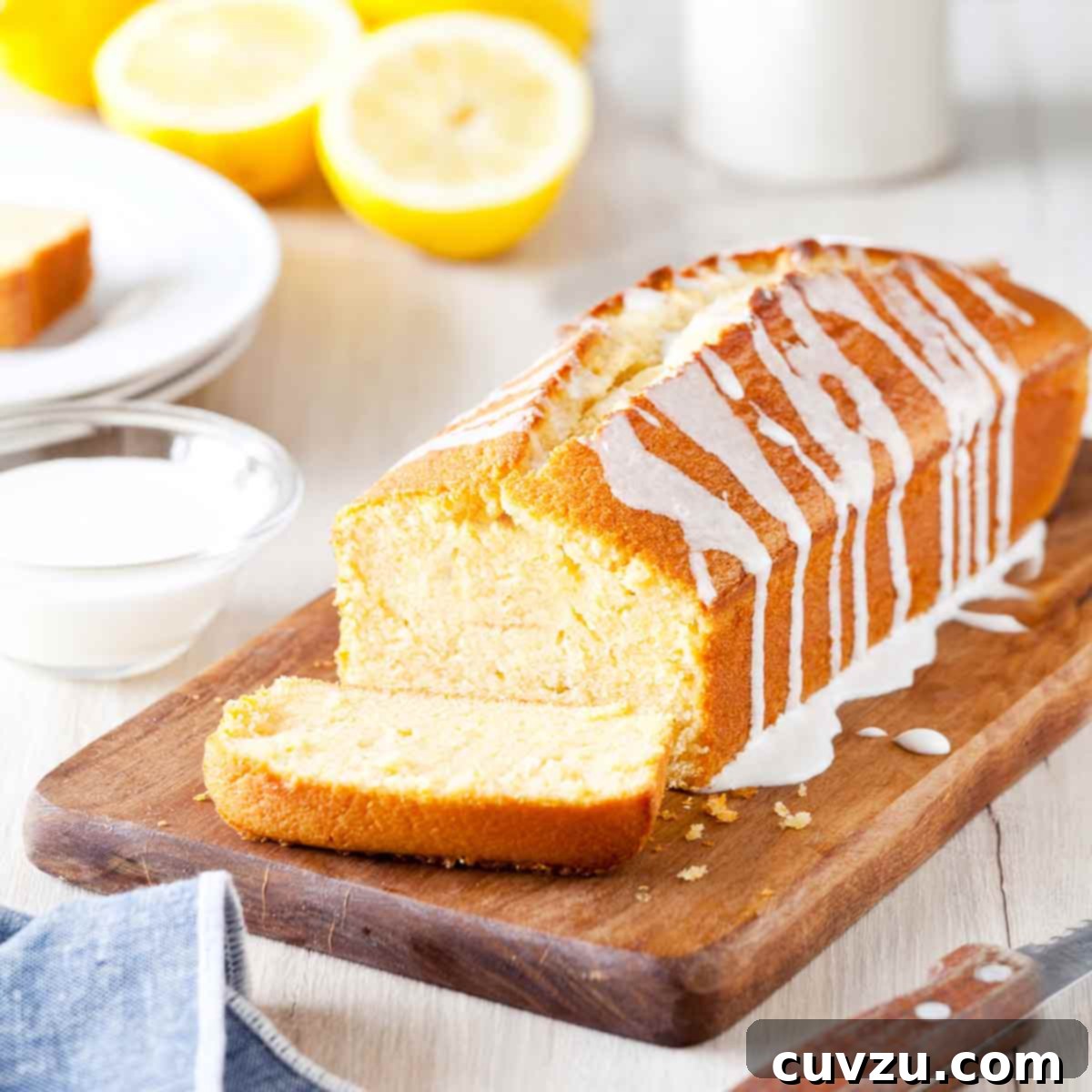 6 Irresistible Snacking Cakes You Need to Try 5 Ina Garten's lemon cake, a pound cake, on a cutting board, drizzled with a lemon glaze. A bright and zesty lemon cake.