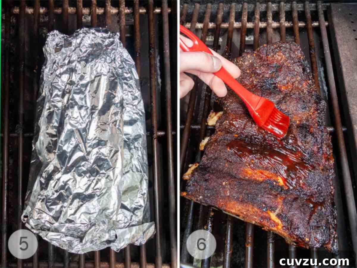 Slow-Smoked Beef Back Ribs 6 A rack of beef ribs wrapped in foil on a grill, then a person brushing the rack of ribs with barbecue sauce.