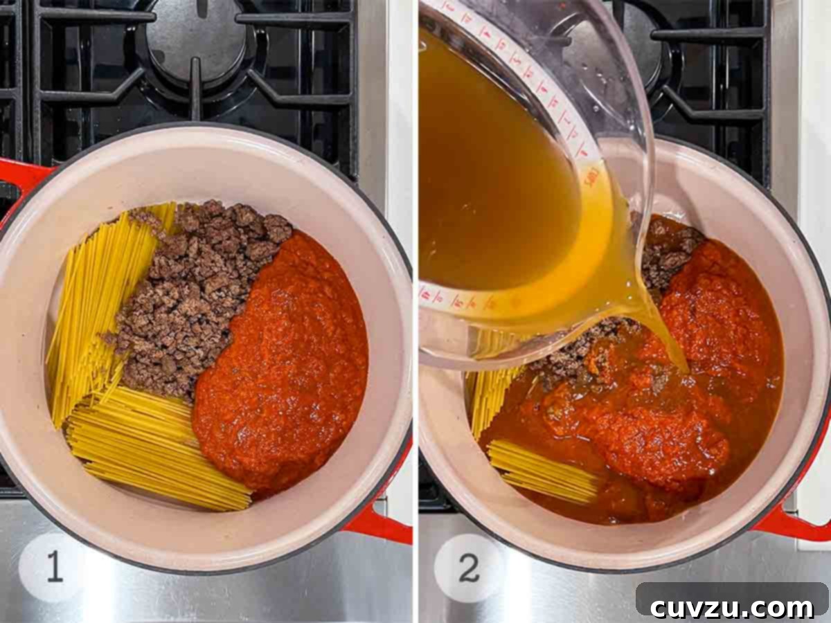 Easy One Pot Spaghetti Dinner 4 A large pot with spaghetti, ground beef, and marinara, and broth being poured into it.