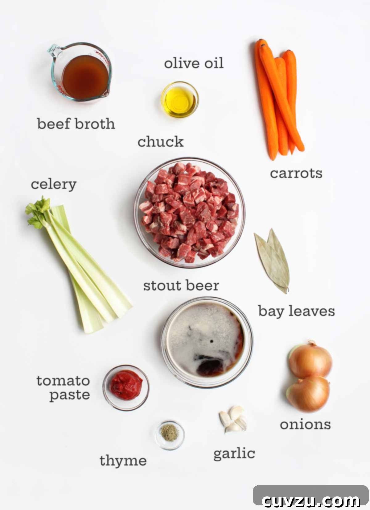 Hearty Slow Cooker Irish Beef Stew 3 The ingredients for Irish beef stew on a white background.