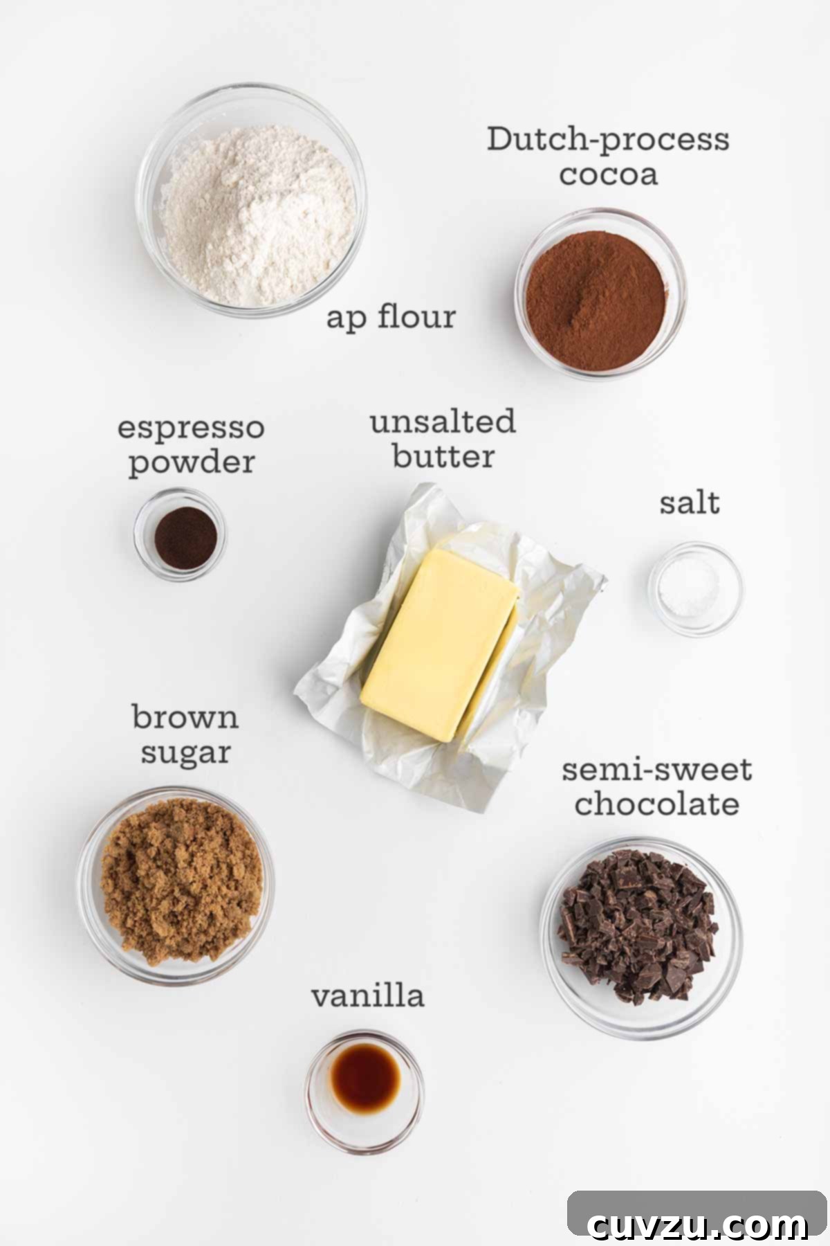 Rich Chocolate Espresso Shortbread 4 Ingredients for chocolate espresso shortbread cookies--flour, cocoa, butter, salt, espresso powder, brown sugar, semi-sweet chocolate, and vanilla.
