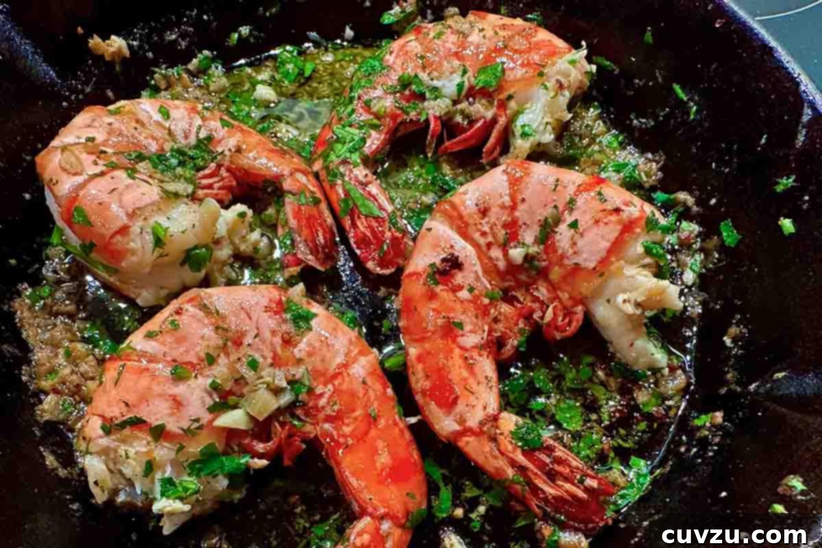 Garlic Lemon Shrimp Scampi 12 Garlic butter shrimp scampi in a cast-iron skillet, topped with fresh parsley and simmered in a flavorful, garlicky sauce.