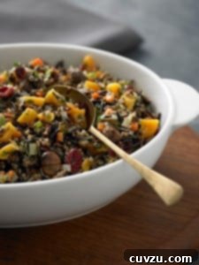 Close-up of Wild Rice with Roasted Chestnuts and Cranberries, showcasing its rich texture and festive colors.