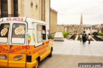Liege Waffles: Belgian Bliss 3 A charming waffle truck in a vibrant Brussels market, promising delicious Belgian street food like the famous Liège waffles.