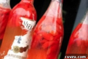 Four bottles of pepper sherry.