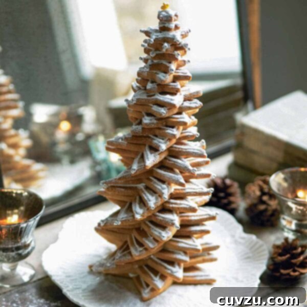 Sweet Christmas Tree Sculpture 3 A Christmas tree made of decorated cookies.