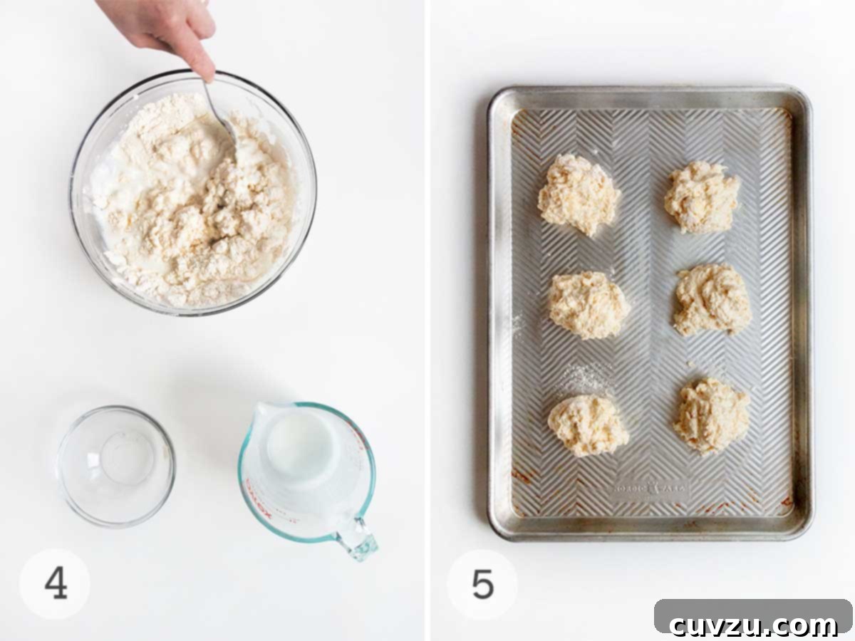 A person gently mixing buttermilk into the biscuit dough in a bowl, and then a baking sheet with six perfectly formed, unbaked drop biscuits.