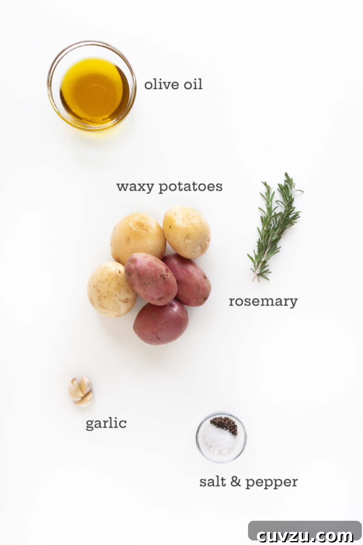 Smoky Golden Grilled Potatoes 4 Ingredients for roasted potatoes on the grill--waxy potatoes, oil, rosemary, garlic, and salt and pepper.