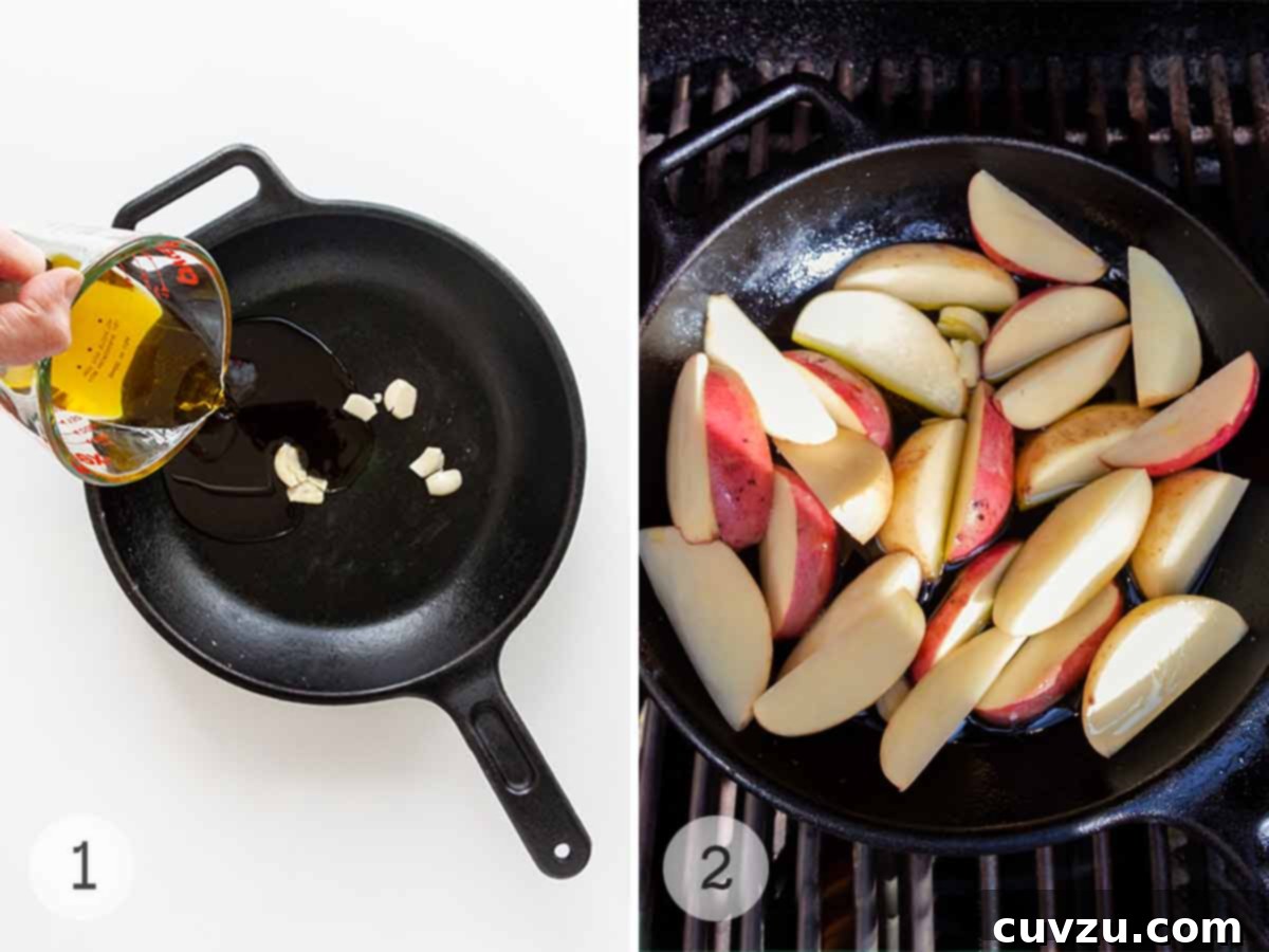 Smoky Golden Grilled Potatoes 5 A person pouring oil into a skillet with garlic and a skillet of potato wedges on a grill.